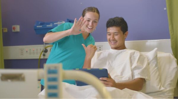 young person and nurse using the Canteen Robots service at hospital